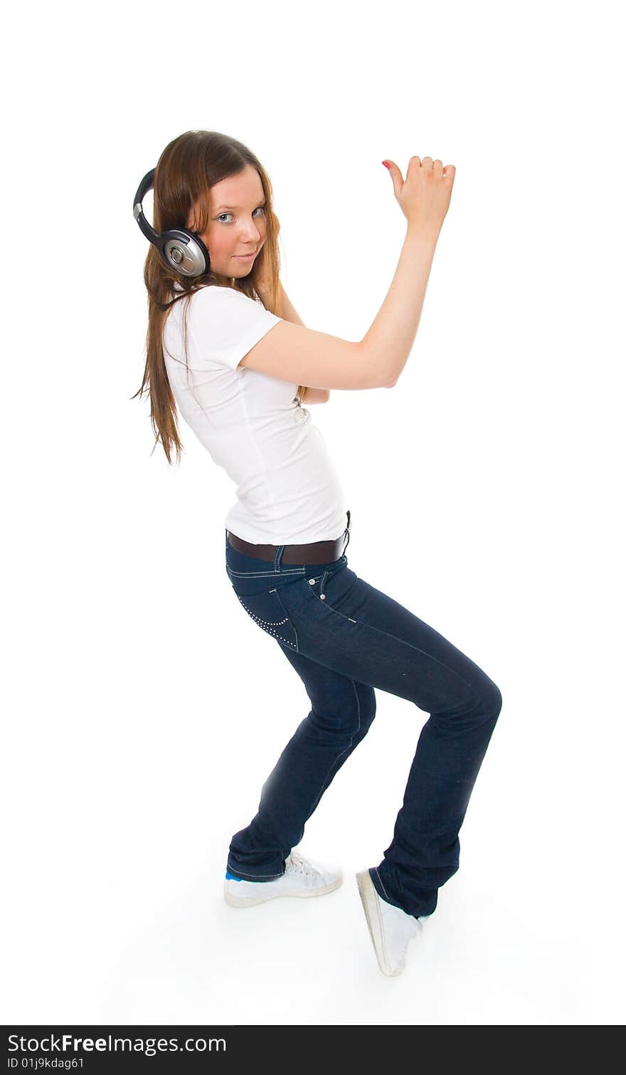 The young girl with a headphones isolated on a white background