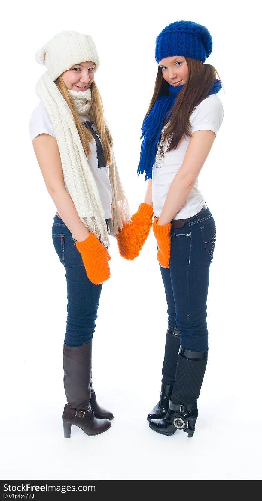 Two attractive girls isolated on a white background