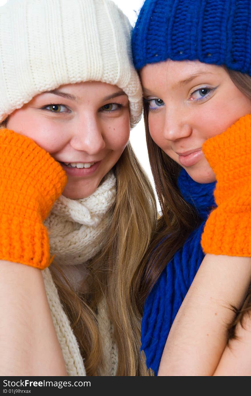 Two attractive girls isolated on a white background