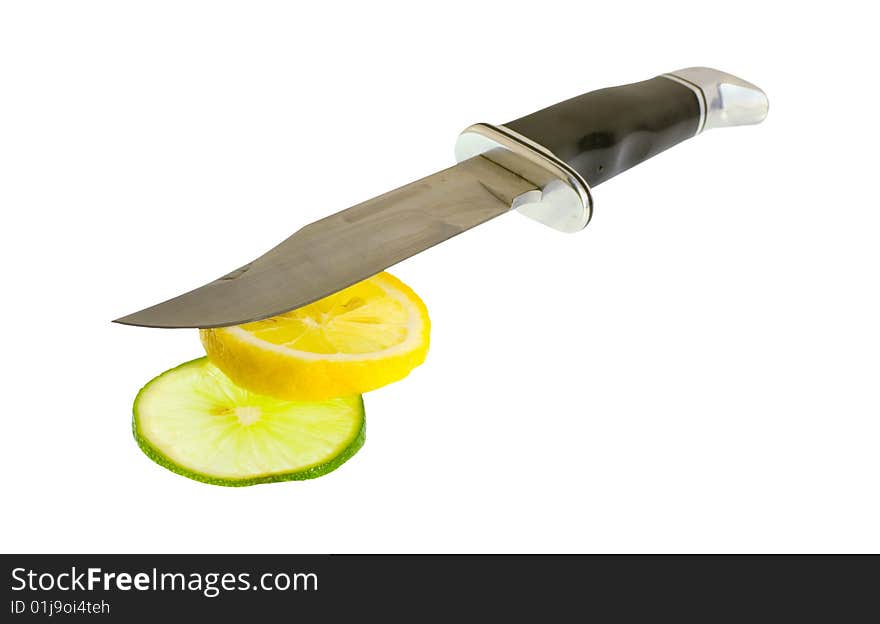 Sharp knife and slices of citrus isolated on white. Sharp knife and slices of citrus isolated on white