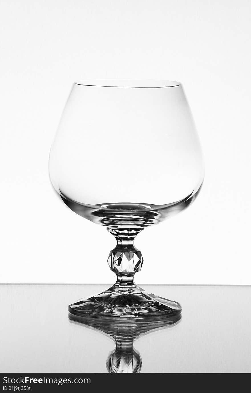 Tall wine glass on light background