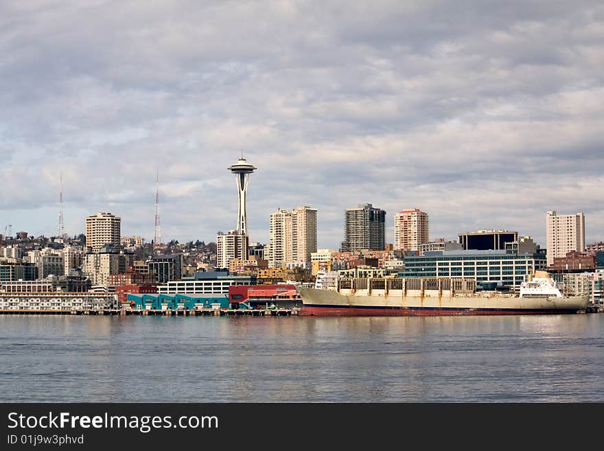 Pier 59 waterfront area of Seattle, including downtown and the Space Needle, taken from the ferry in the Puget Sound. Pier 59 waterfront area of Seattle, including downtown and the Space Needle, taken from the ferry in the Puget Sound.