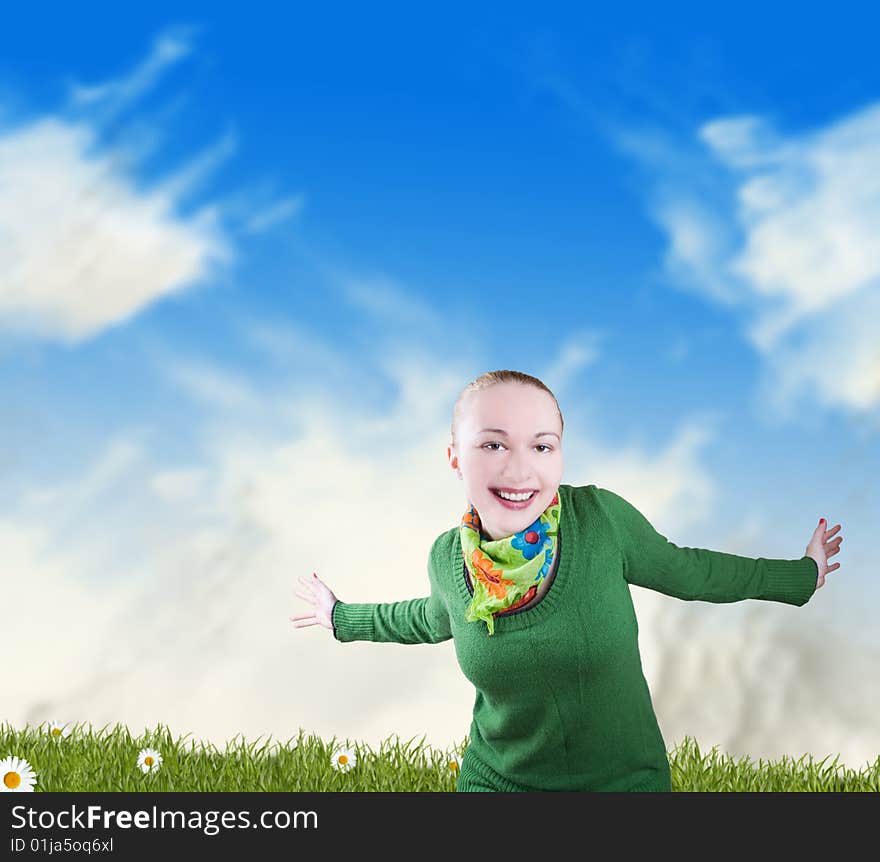 Smiling girl on a meadow