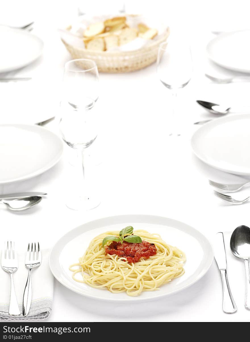 Pasta with tomato sauce basil and grated parmesan