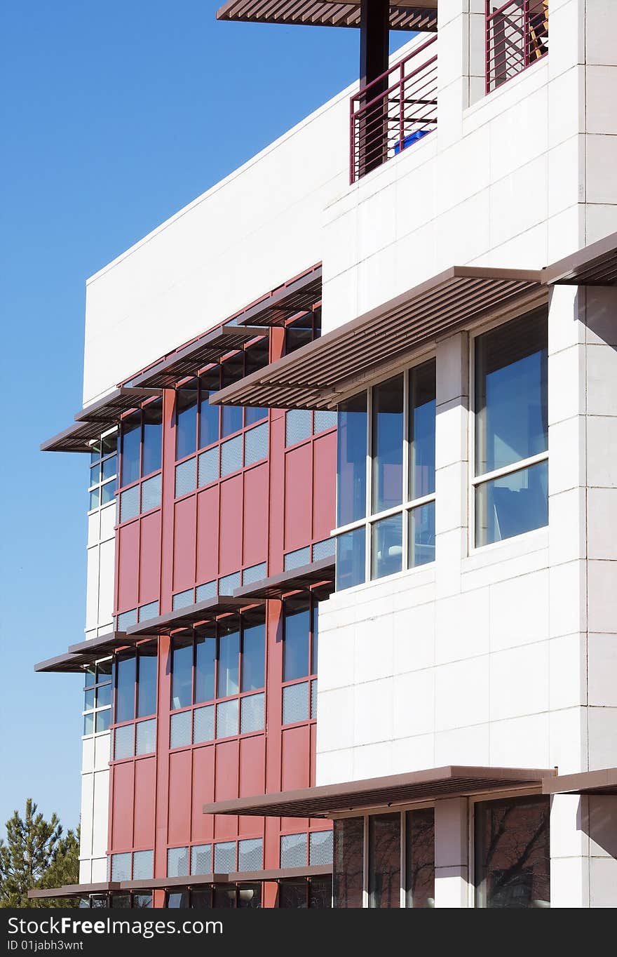 Modern apartment building in an urban setting. Modern apartment building in an urban setting.