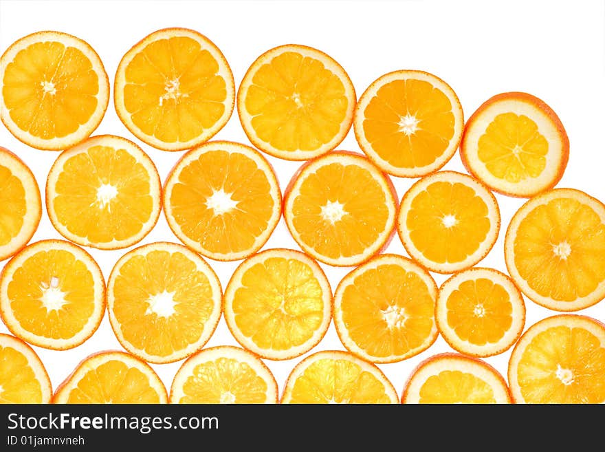 It is a lot of segments of oranges on a white background. It is a lot of segments of oranges on a white background