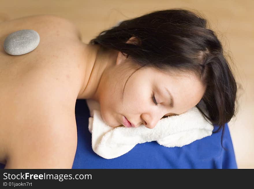 Woman resting and enjoying a spa treatment