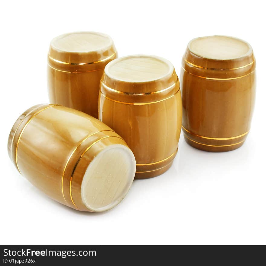 Gold tuns from wine cellar isolated on a white background