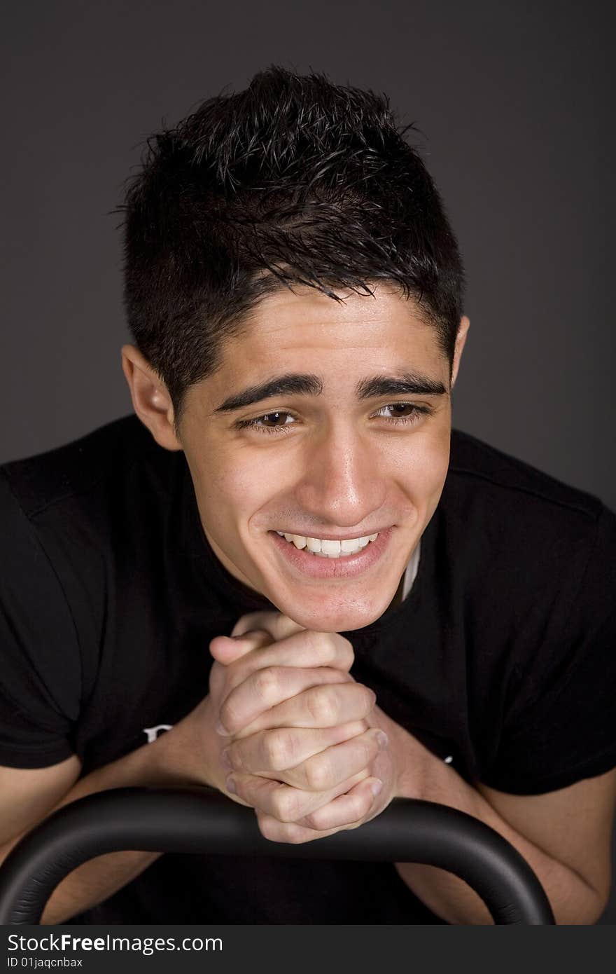 Fashion portrait of teenager over grey background