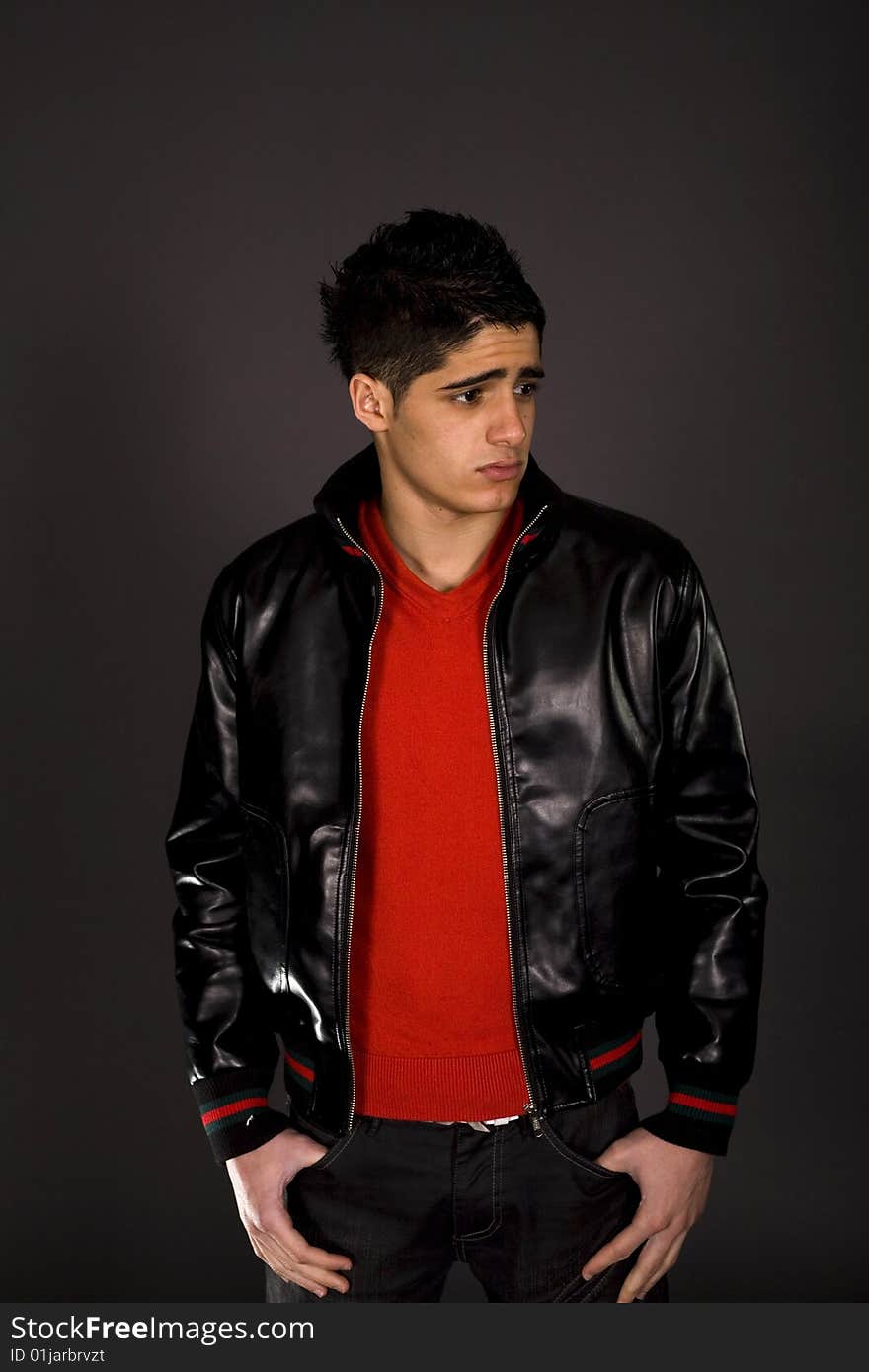 Fashion portrait of teenager over grey background