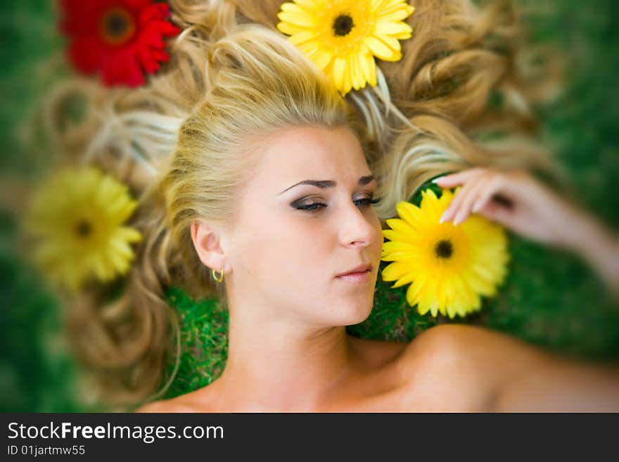 Blonde in flowers