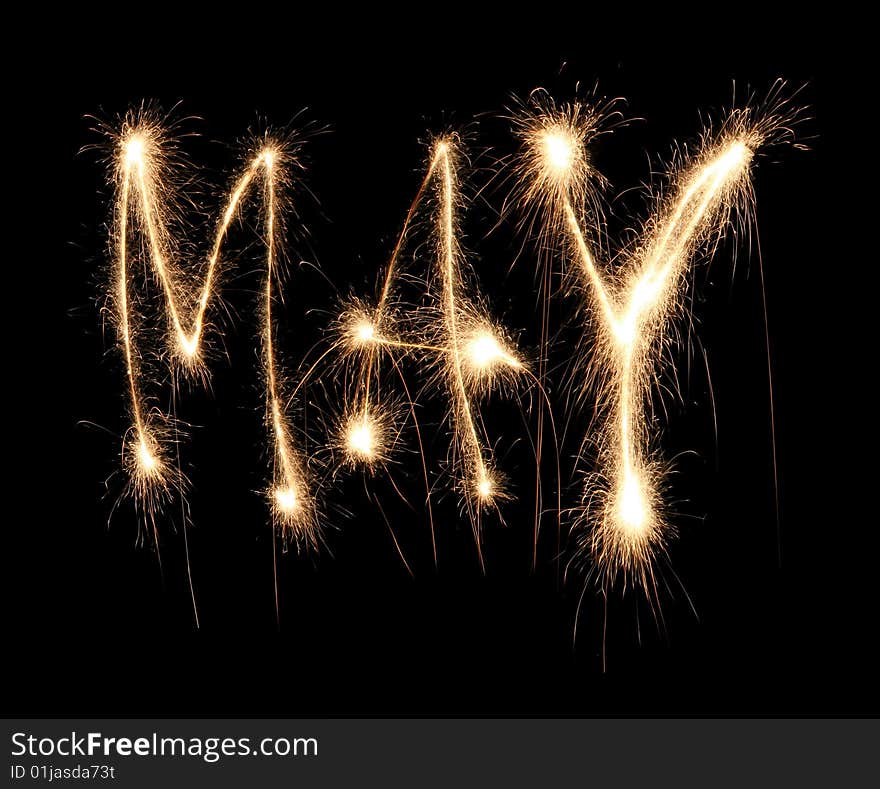 Month may sparkler on dark