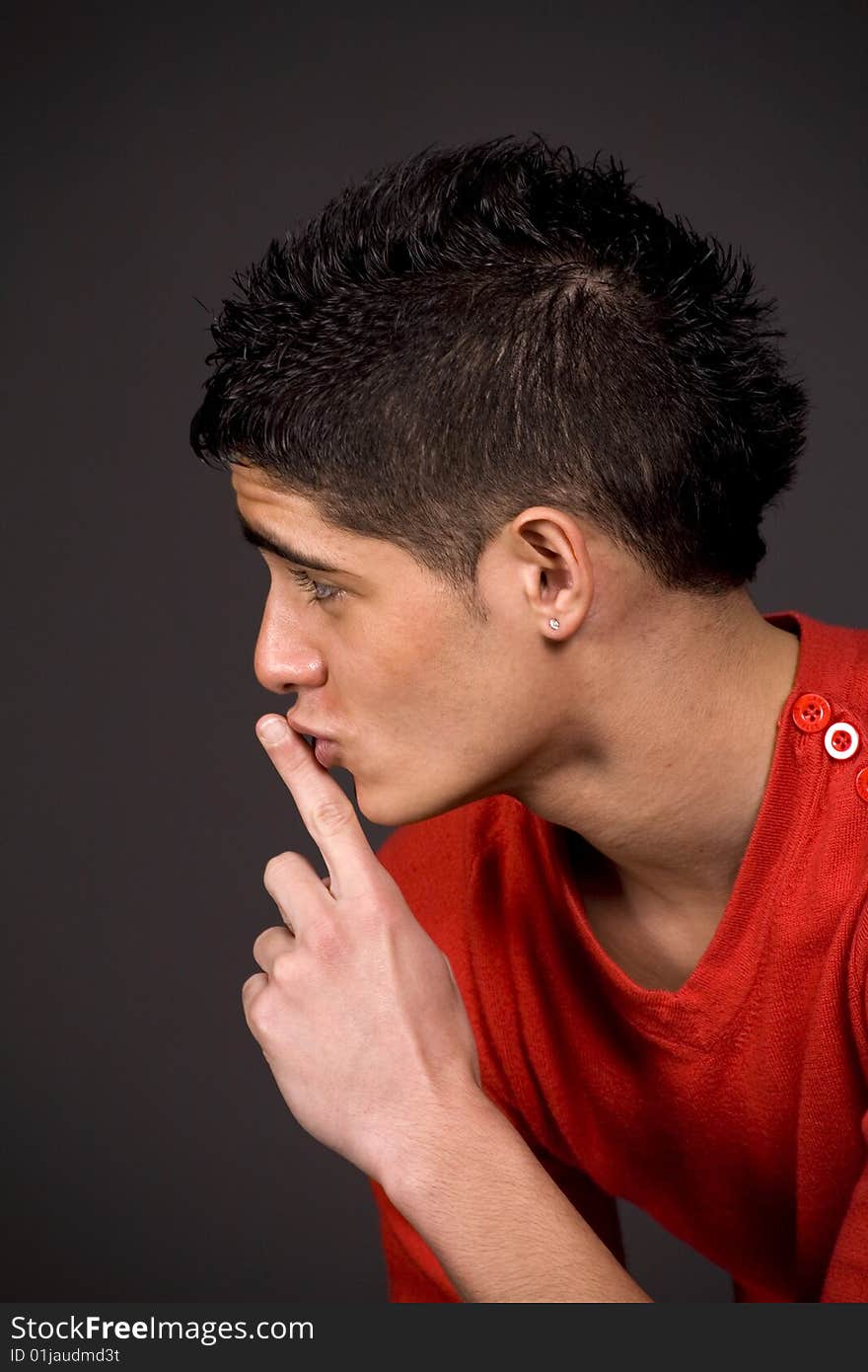 Fashion portrait of teenager over grey background