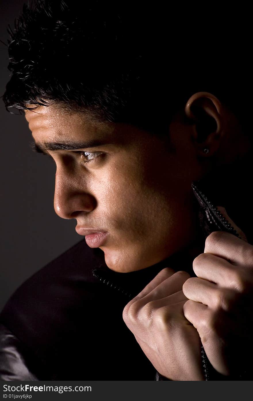 Fashion portrait of teenager over grey background