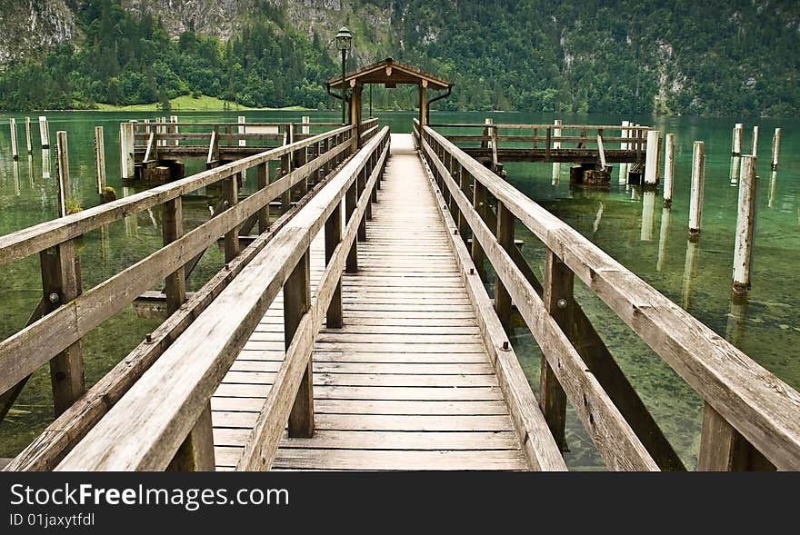 Pier on a lake in Bavarian Alps