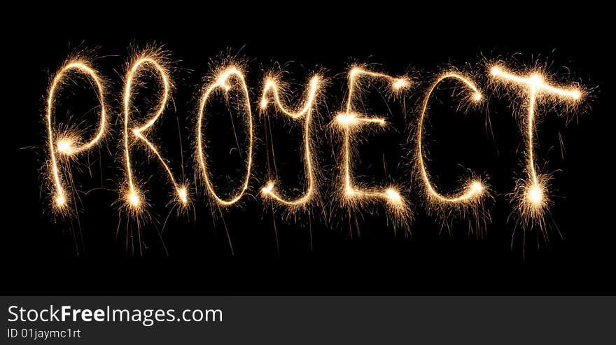 Word project written sparkler on dark