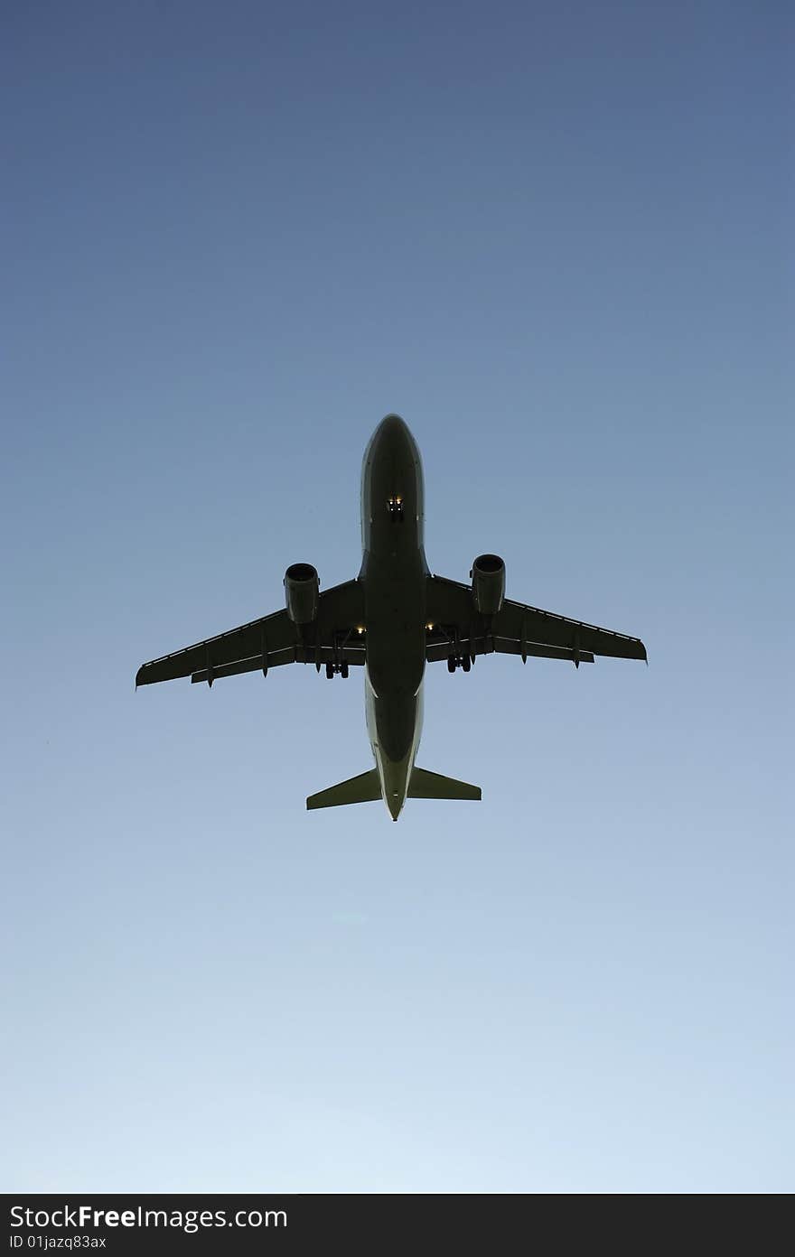 an airplane is landing at airport munich in germany