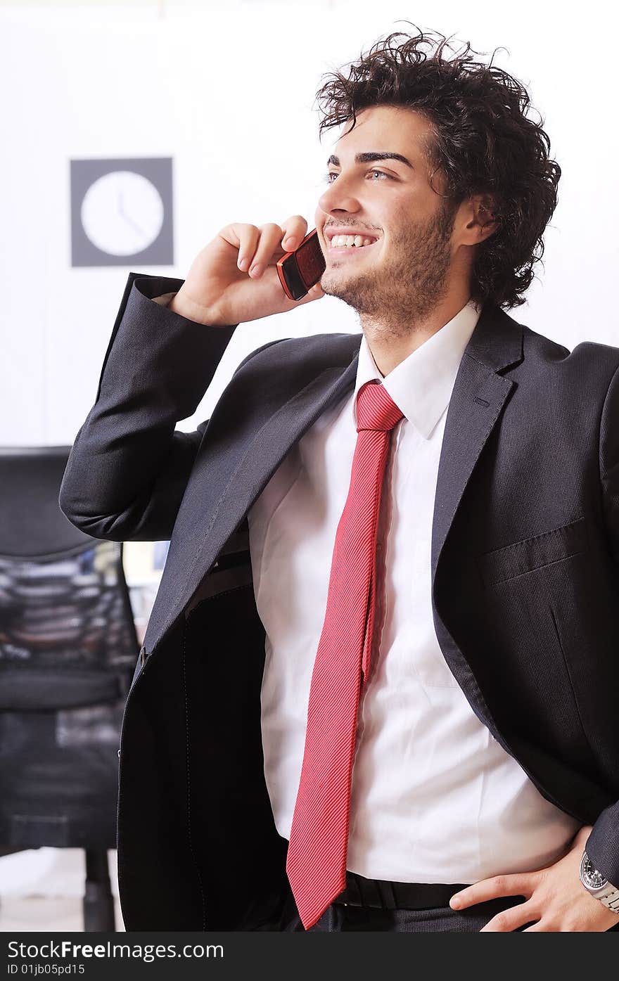 Businessman uses telephon