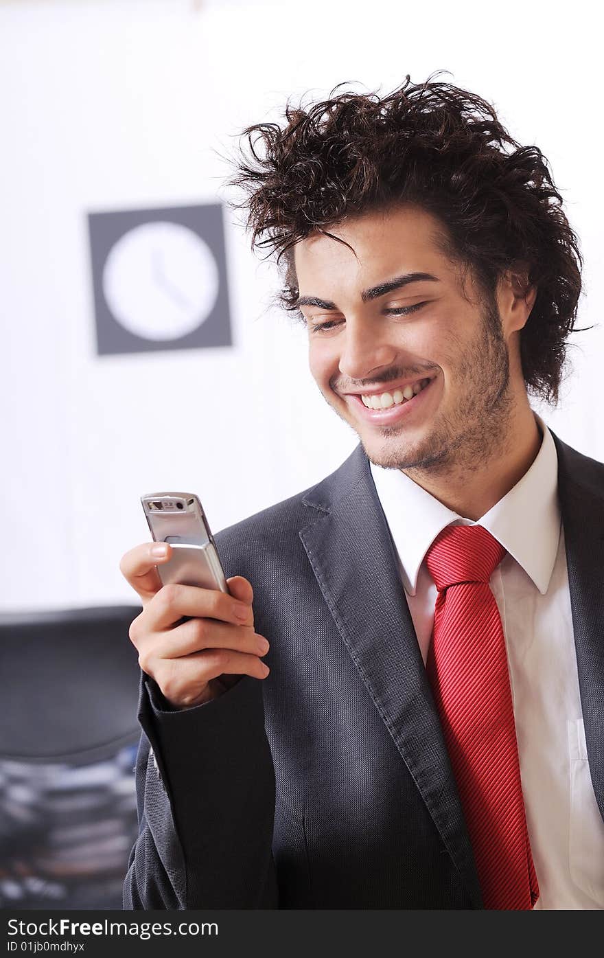 Businessman uses telephone