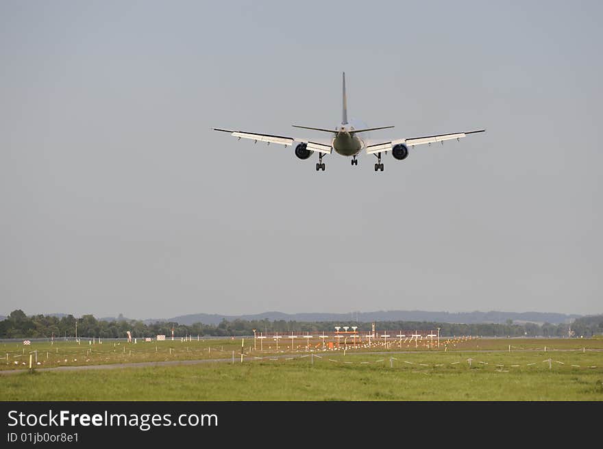 An airplane is landing at airport munich in germany