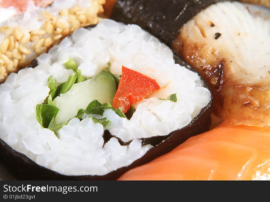 The Japanese meal with rice a fish and sea seaweed.