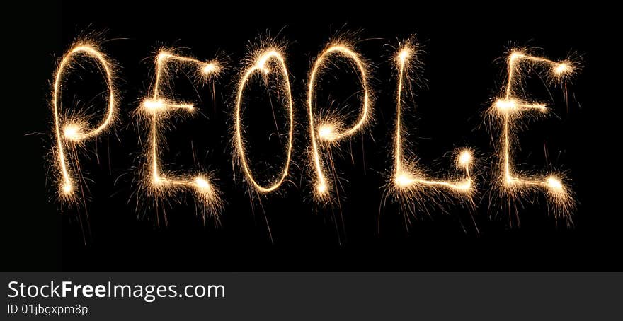 Word people written sparkler on dark