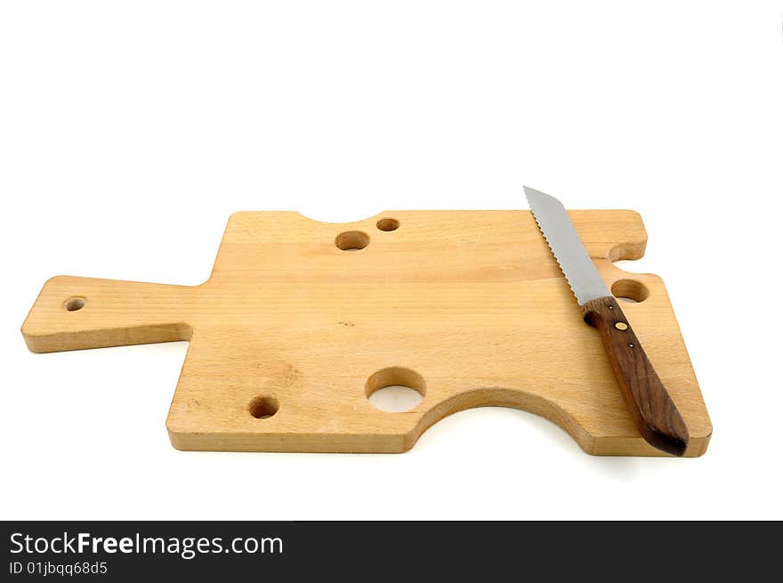 Big chopping board and knife on white background