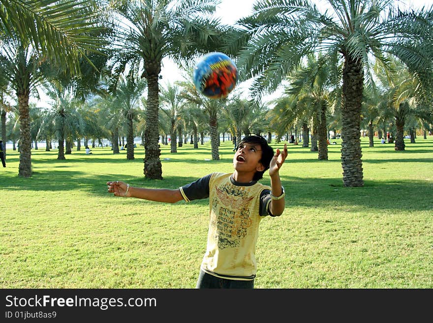 Indian boy enjoying his holidays in the park. Indian boy enjoying his holidays in the park