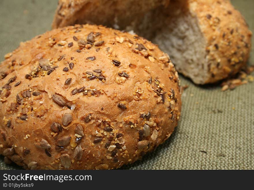 Close-up with dark grain seed bread and grains. Close-up with dark grain seed bread and grains