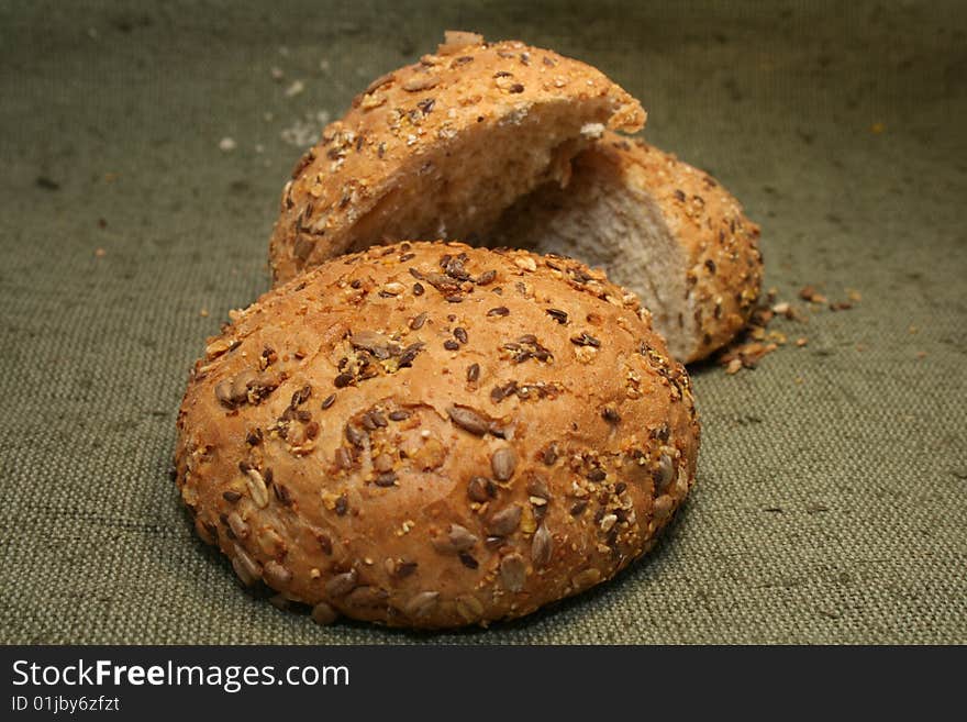 Close-up with dark grain seed bread and grains. Close-up with dark grain seed bread and grains