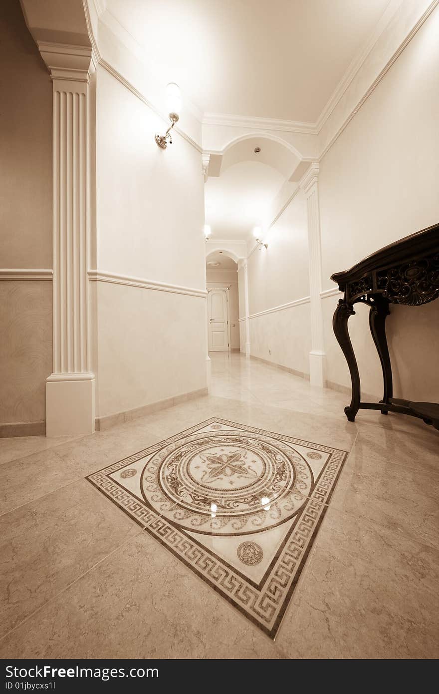 Beautiful corridor with a door in a modern apartment