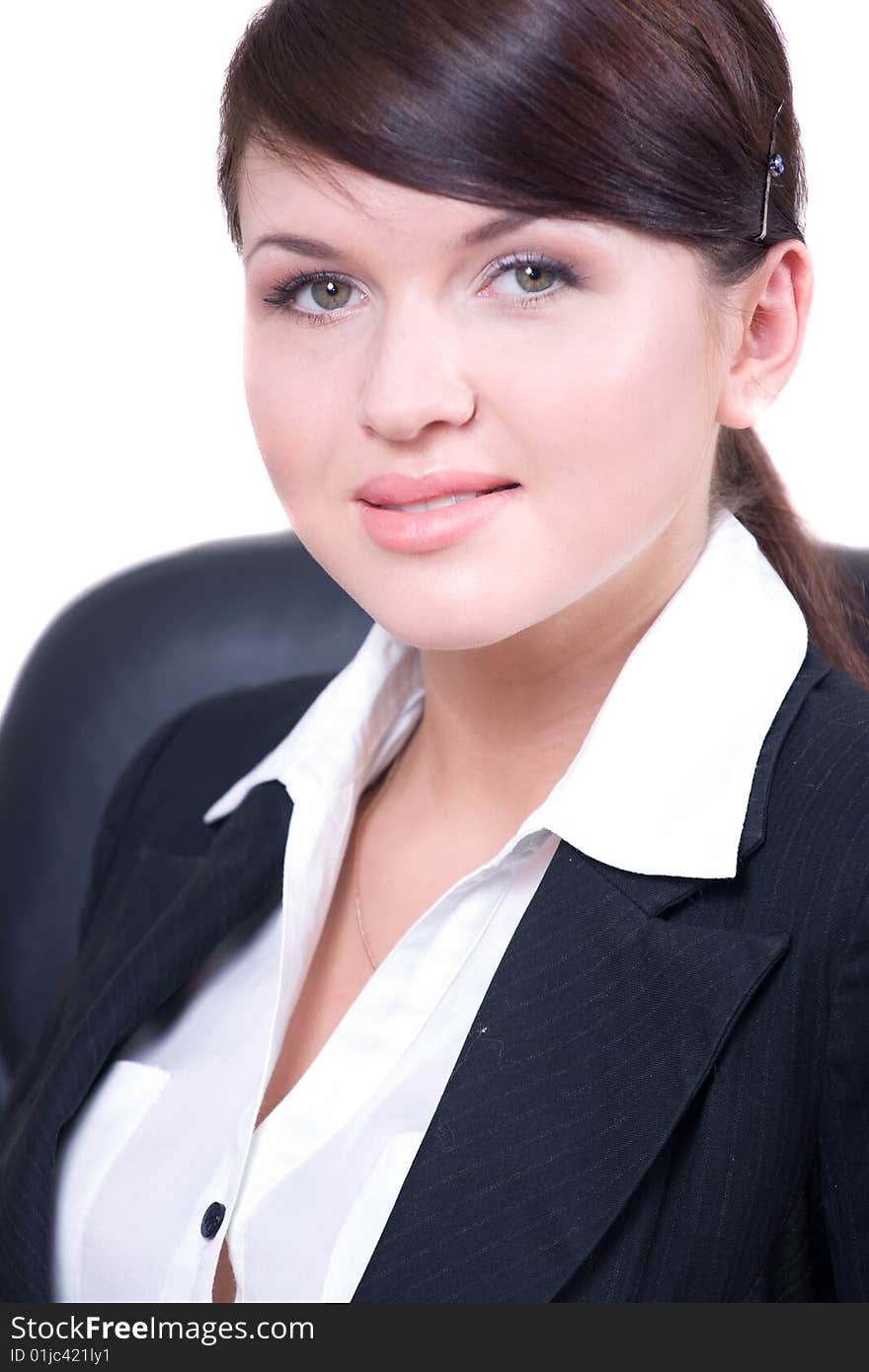 Portrait of young beautiful woman in office environment