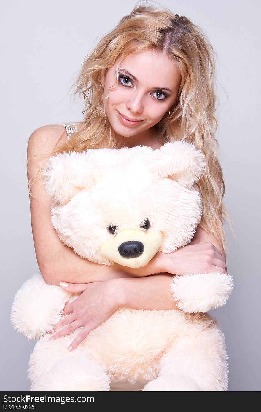 Beautiful Girl With A Teddy Bear