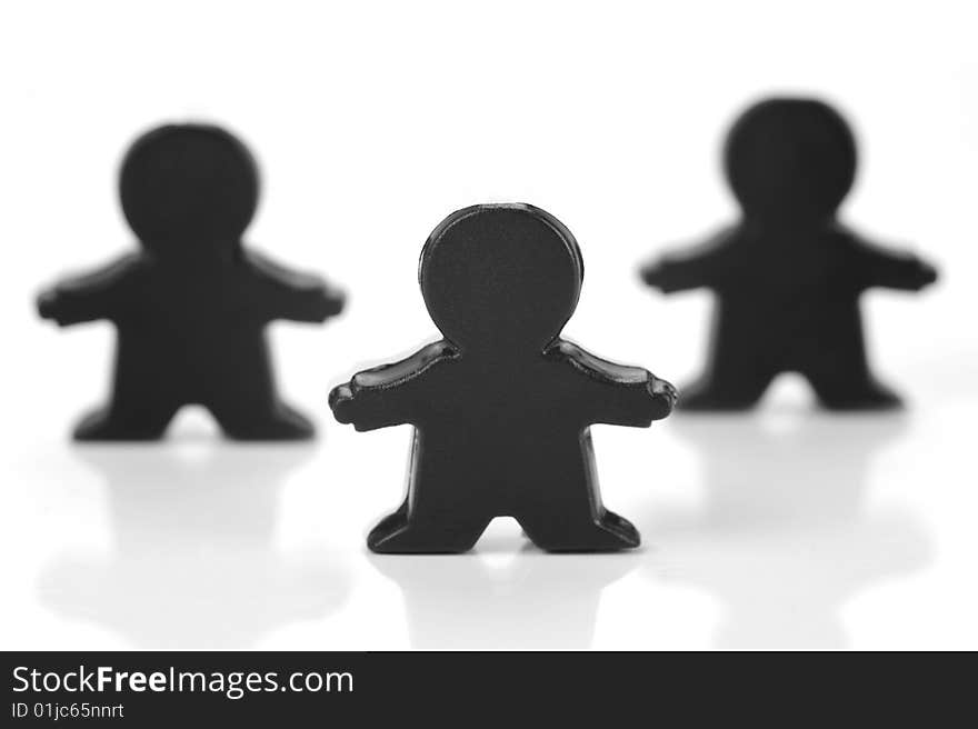 Miniature figurines isolated against a white background