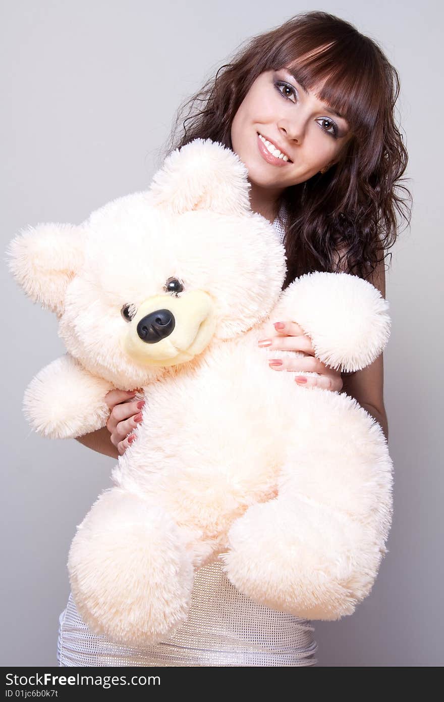 Beautiful Girl With A Teddy Bear