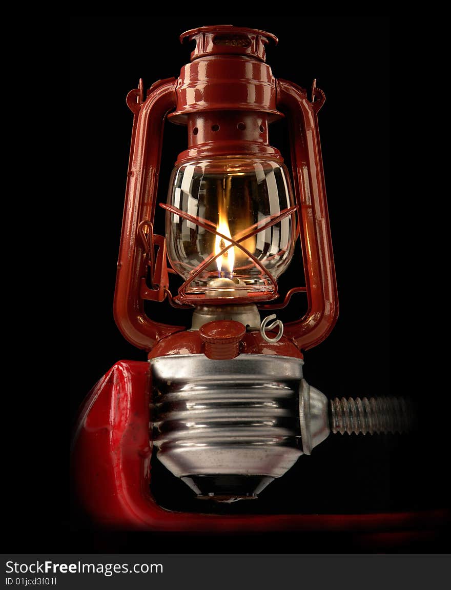 Kerosene lamp on a black background