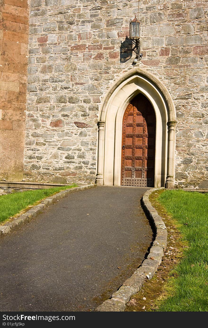 Path leading to a large church door. Path leading to a large church door