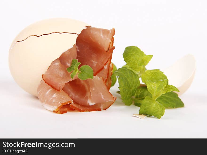 Easter egg with ham and herbs