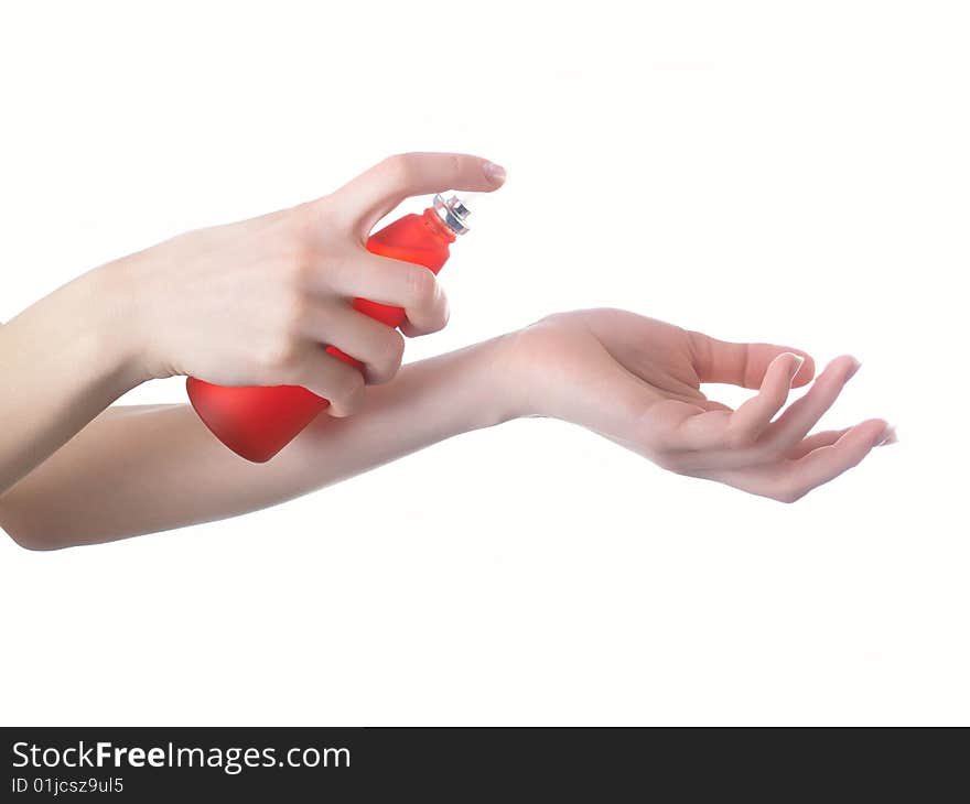 Hand with perfumery on isolated