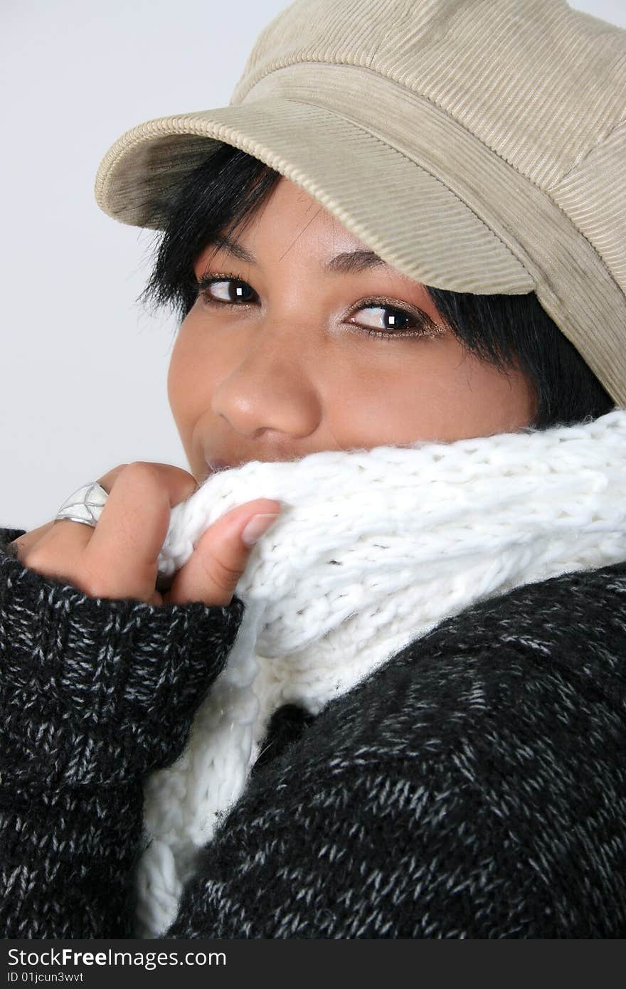 Beautiful young woman dressed in winter clothing. Beautiful young woman dressed in winter clothing