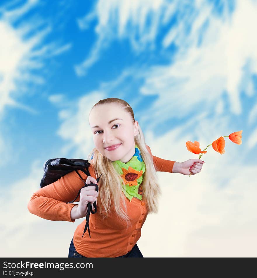 Happy smiling girl with poppies and shoes in hands - against the blue sky. Happy smiling girl with poppies and shoes in hands - against the blue sky