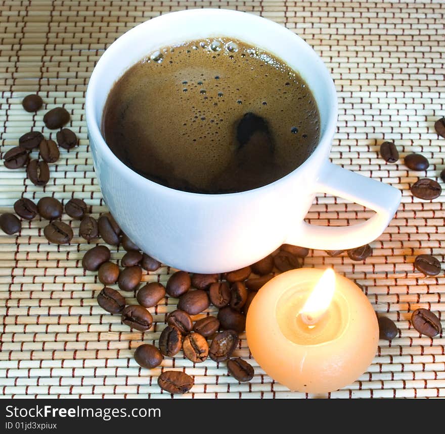 Cup of coffe with candle