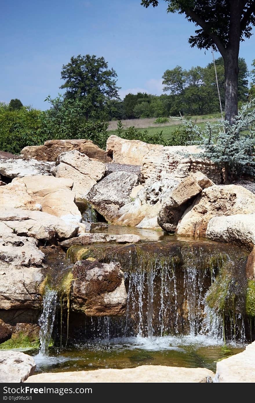 Rural waterfall through rock formation. Rural waterfall through rock formation