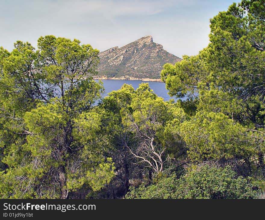 View of island Dragonera, from the top of the cliff near the village of Santelmo Mallorca. View of island Dragonera, from the top of the cliff near the village of Santelmo Mallorca