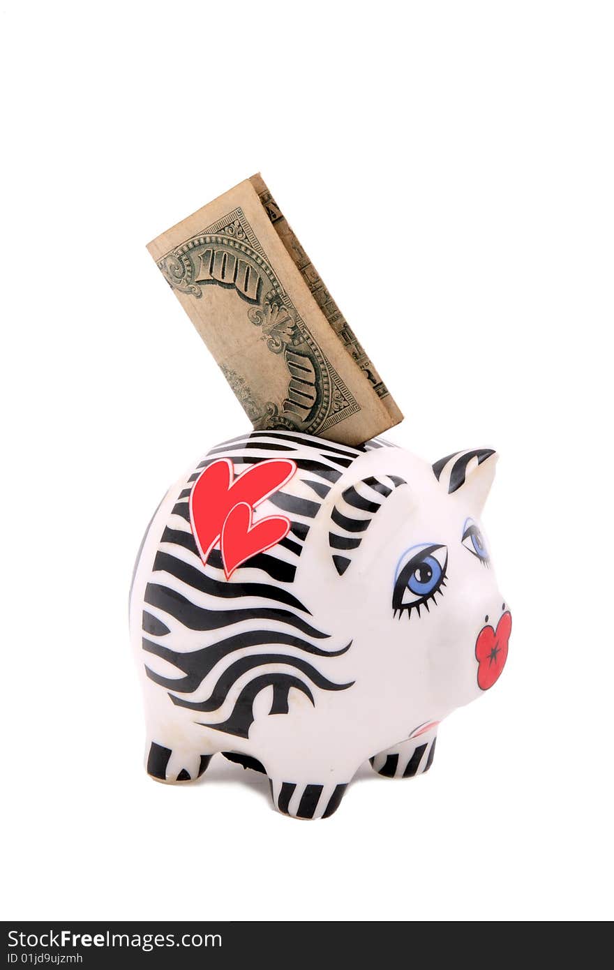 A piggy bank with the hundred dollar bills on white.