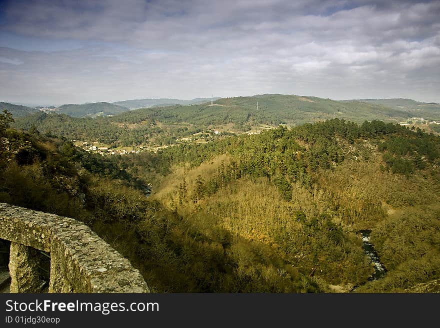 River landscape in the valley of two mountains