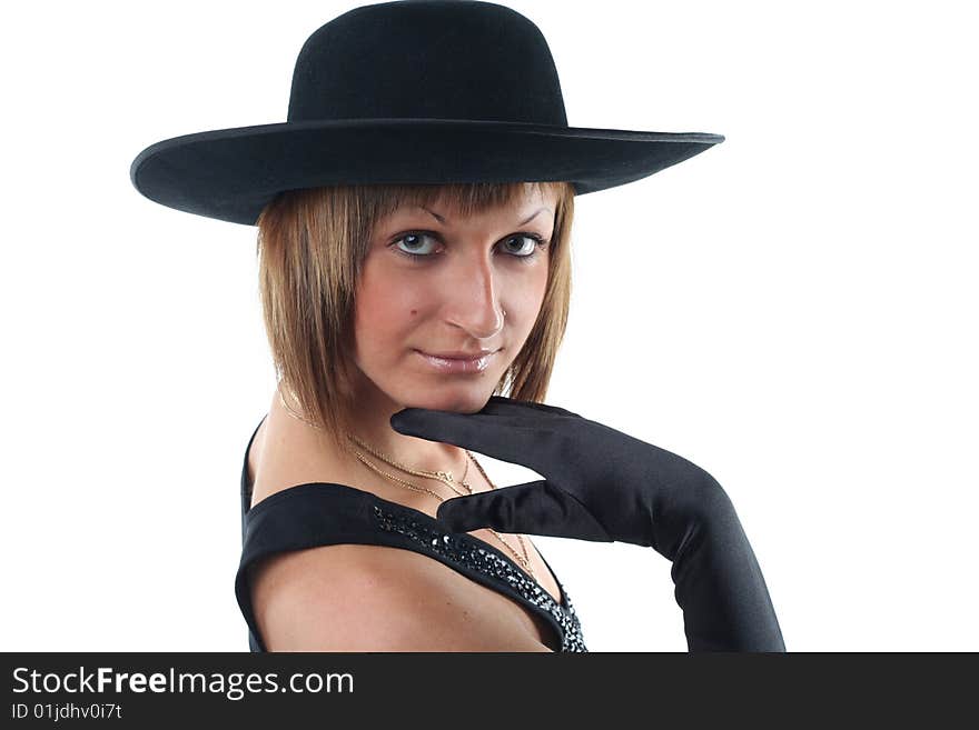 Lovely young woman in hat and gloves isolated on white background