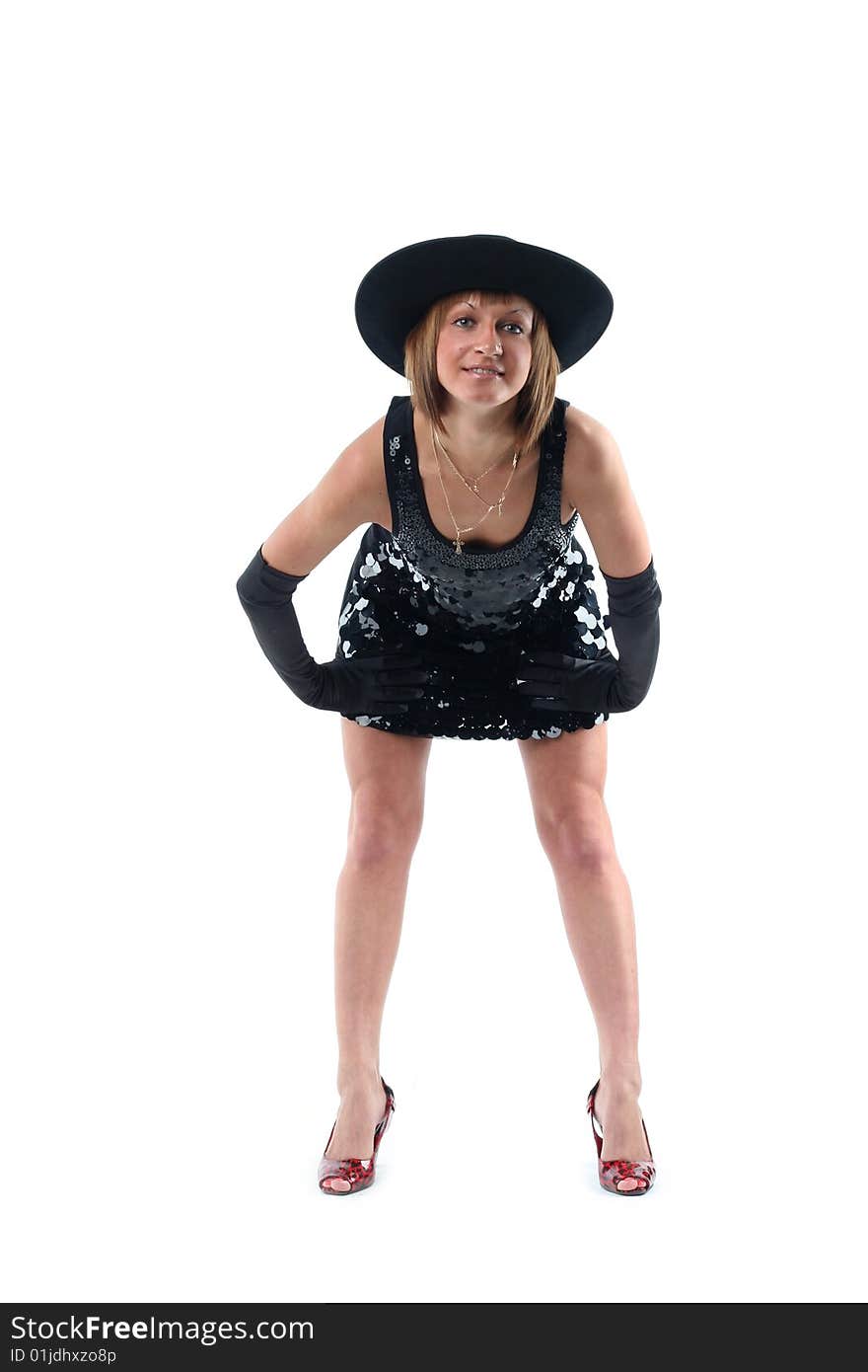 Lovely young woman in hat and gloves isolated on white background