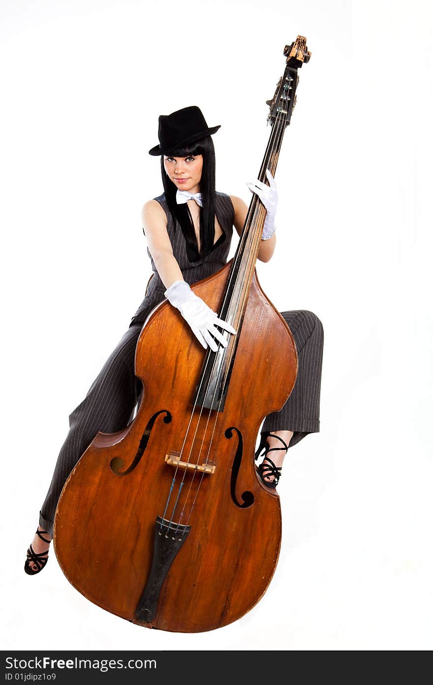 Young beautiful brunette with old contrabass