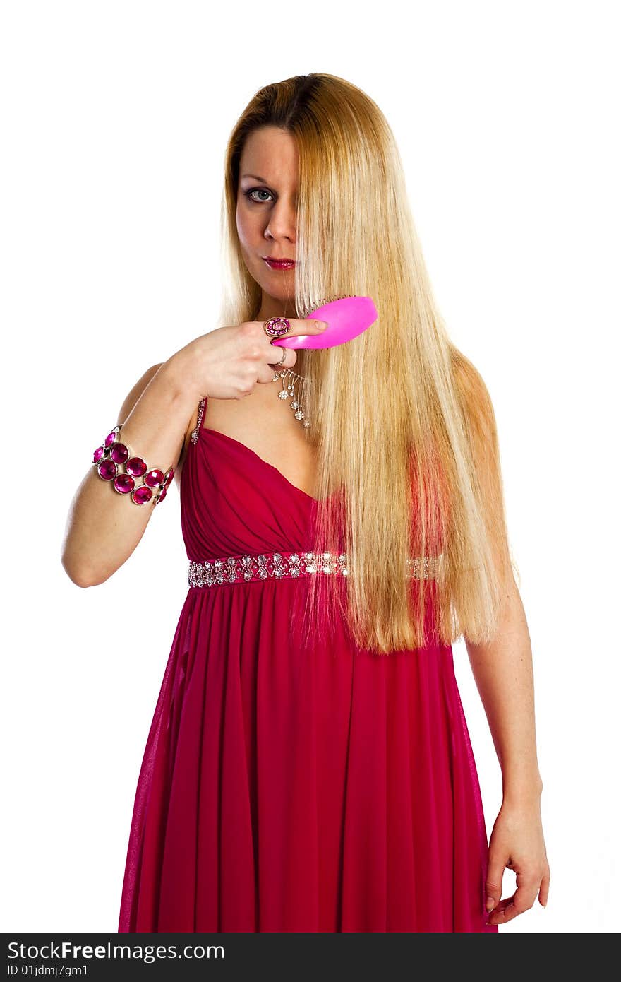 Long hair blonde woman with hairbrush in her hand. Long hair blonde woman with hairbrush in her hand